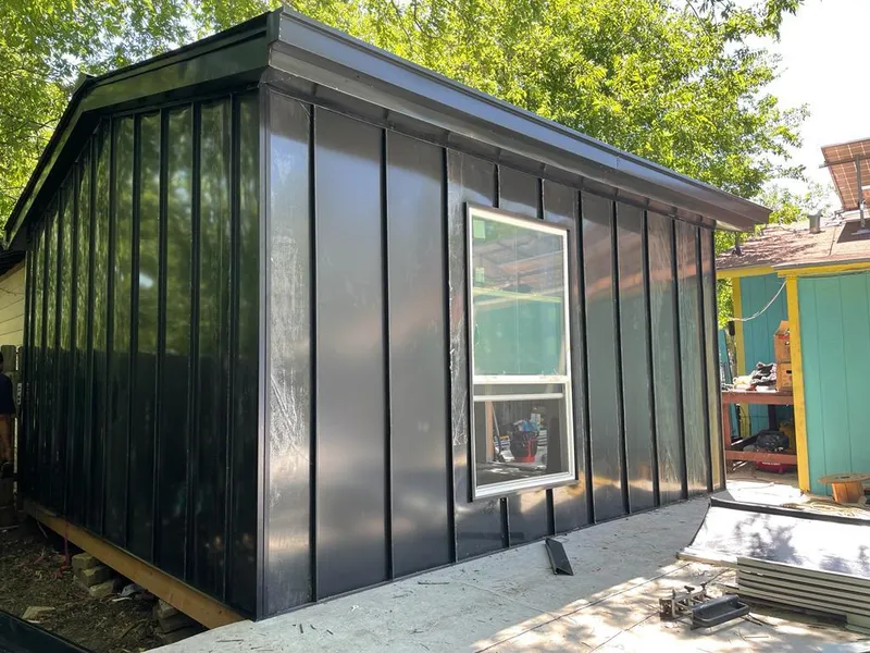 Black standing seam metal wall panels for Roof Inspection in Wakefield